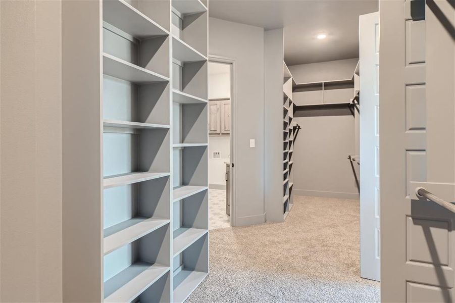 Full bathroom with vanity, washtub / shower combination, toilet, and tile patterned floors