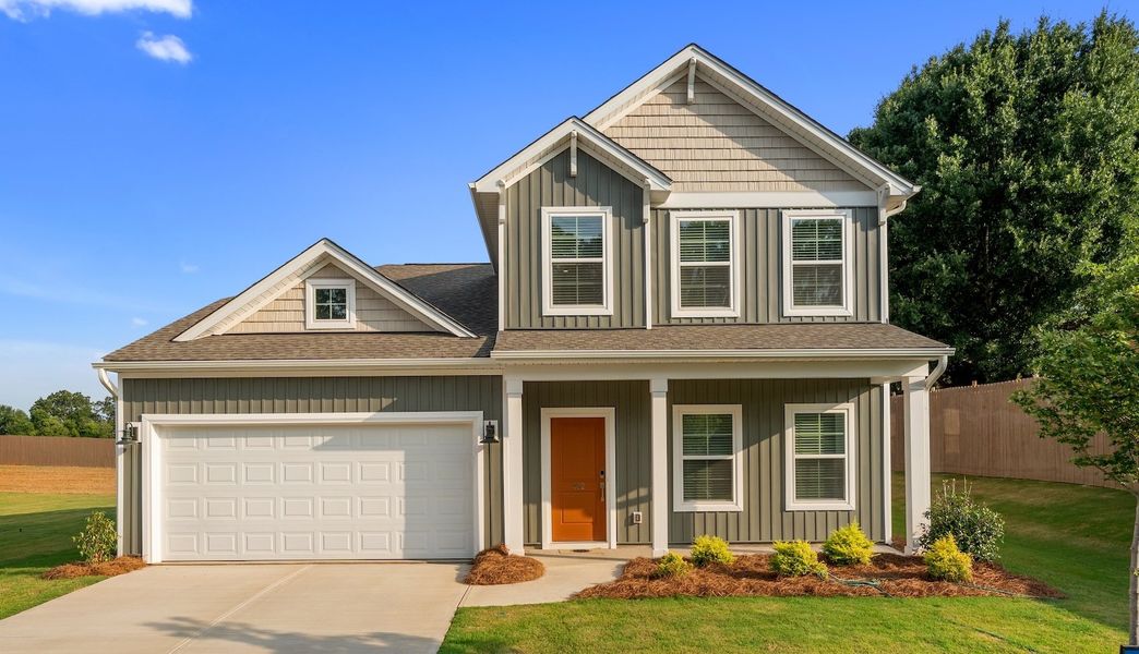 Front exterior of a new home in Dove Hollow, Chesnee, SC, highlighting curb appeal (Image 1). Front exterior of a new home in Dove Hollow, Chesnee, SC, highlighting curb appeal (Image 1).