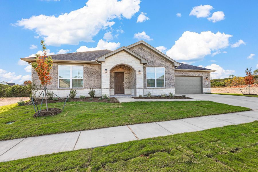 Representative exterior photo of a completed home built from the Garrison I by Cheldan Homes in Stoneview, Glen Rose, TX (Image 27).