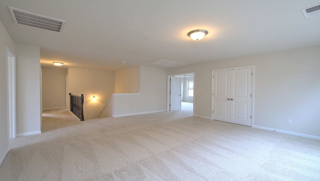 Spacious, unfurnished interior of a new home in Reserve at Tap Root Farms, Fletcher (Image 41).