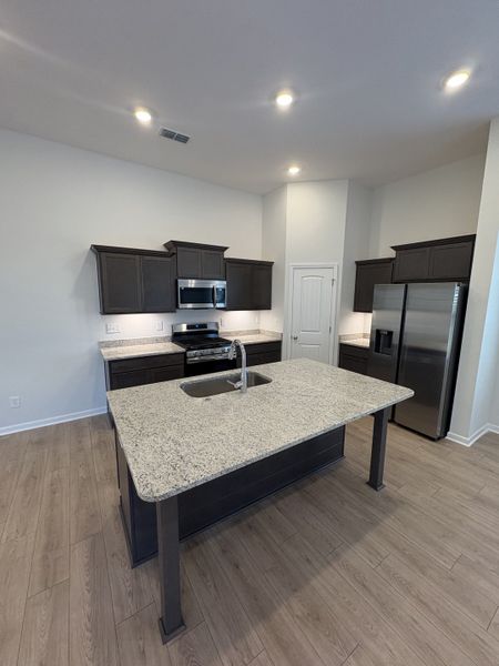 Furnished interior view inside a new home in Burton Farms, Smyrna (Image 4).