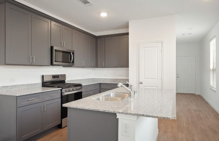 Furnished interior view inside a new home in Crosby Farms, Crosby (Image 3). Furnished interior view inside a new home in Crosby Farms, Crosby (Image 3).