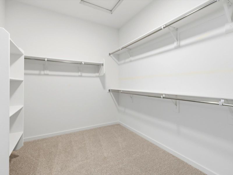 Spacious, unfurnished interior of a new home in Blossom Rock Reserve Series, Apache Junction (Image 17).