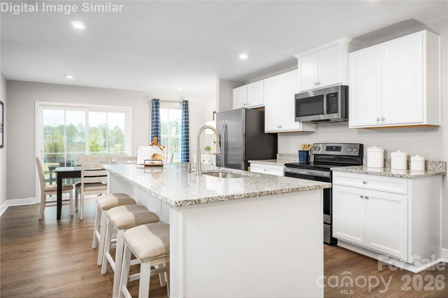 Step into this Kitchen With gleaming granite countertops that offer both durability and style, this space is designed to be the heart of the home. Step into this Kitchen With gleaming granite countertops that offer both durability and style, this space is designed to be the heart of the home.