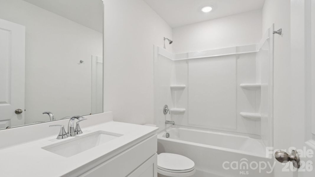 Photo is not of the actual home, but is an inspirational photo of builder’s model home and may depict options, furnishings, and/or decorator features that are not included