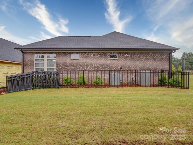 Exterior details and patio area of a home in The Courtyards on New Hope, Gastonia (Image 20).