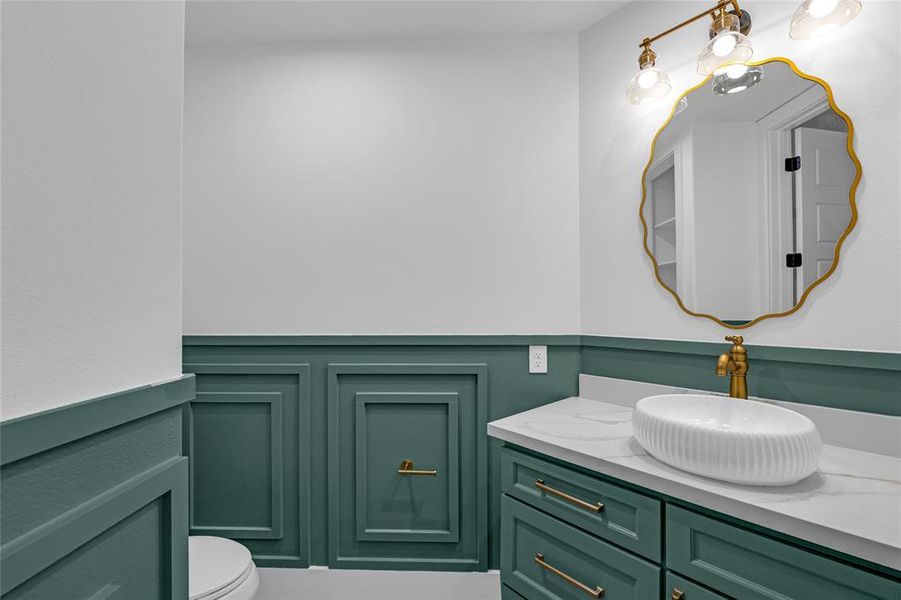 Vintage elegance meets practical design in the thoughtfully appointed downstairs half bath. This is not your average cookie-cutter home! Vintage elegance meets practical design in the thoughtfully appointed downstairs half bath. This is not your average cookie-cutter home!