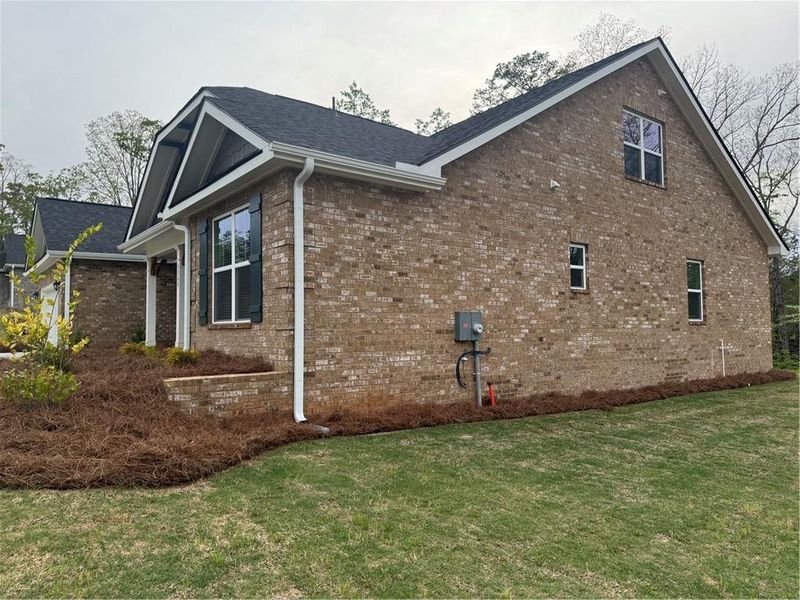 Exterior details and patio area of a home in Tuscany Hills, Douglasville (Image 3).
