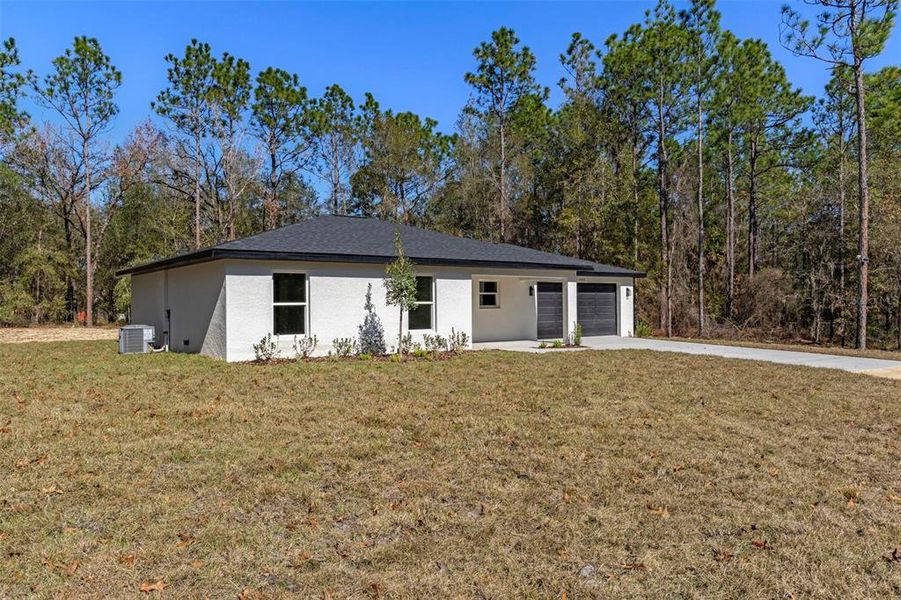 Exterior details and patio area of a home in , Brooksville (Image 26). Exterior details and patio area of a home in , Brooksville (Image 26).
