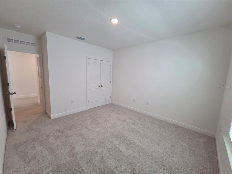 Spacious, unfurnished interior of a new home in Villamar, Winter Haven (Image 36).