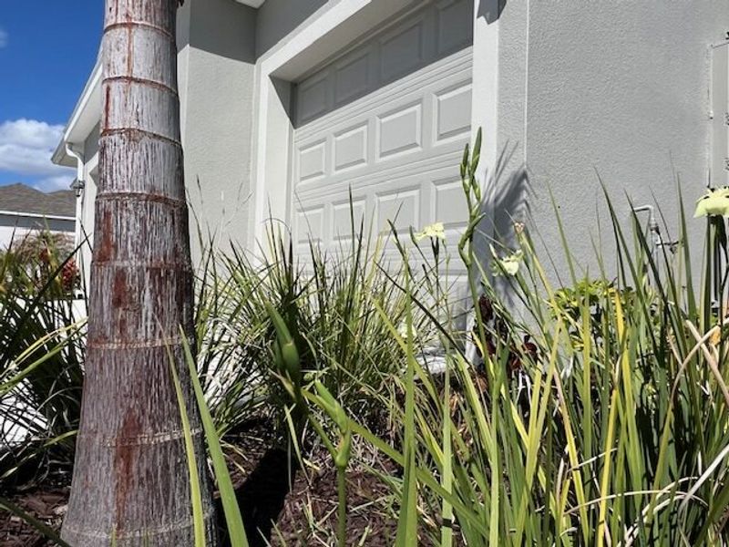 Exterior details and patio area of a home in Lakes At St Sebastian, Micco (Image 18).