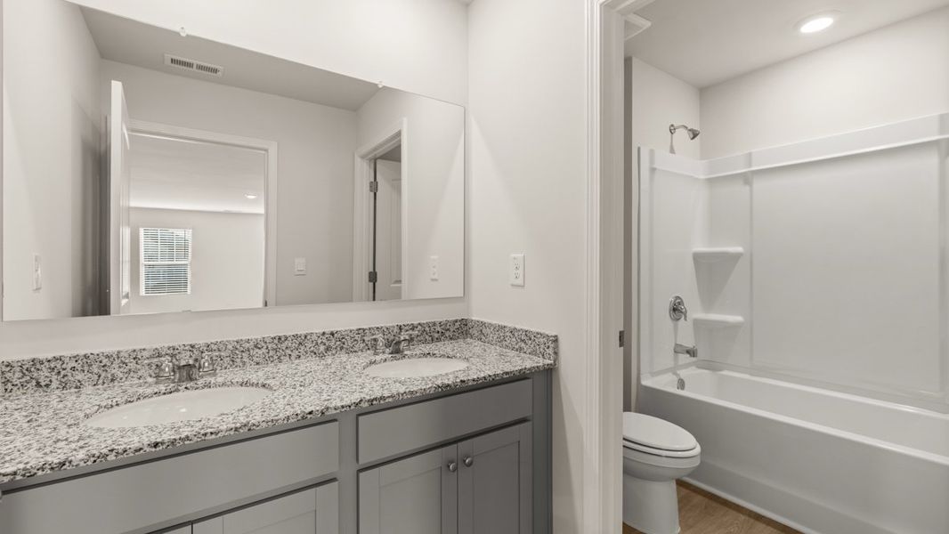 Representative furnished interior of a home built from the Mansfield by D.R. Horton in Northwoods at Mirror Lake, Villa Rica (Image 15). Representative furnished interior of a home built from the Mansfield by D.R. Horton in Northwoods at Mirror Lake, Villa Rica (Image 15).