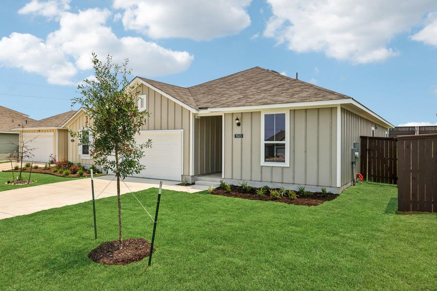 Front exterior of a new home in Cloverleaf, Austin, TX, highlighting curb appeal (Image 2). Front exterior of a new home in Cloverleaf, Austin, TX, highlighting curb appeal (Image 2).
