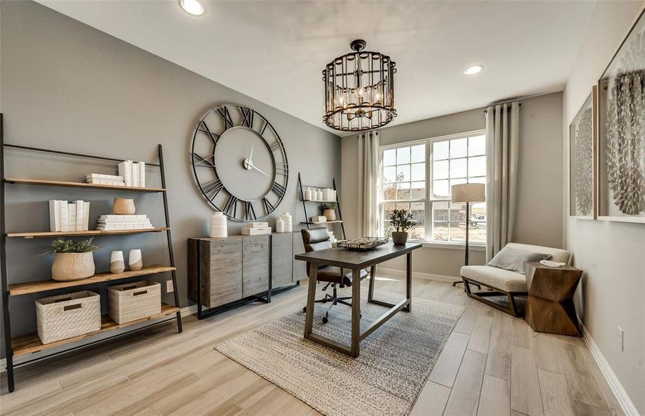 *Actual home, furniture not included - Flexible living space off entryway, can be used as a study