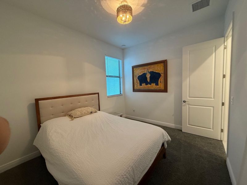 Furnished interior view inside a new home in , Port St. Lucie (Image 10).