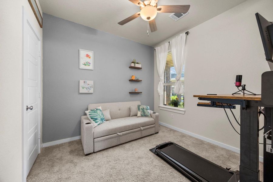 These versatile secondary bedrooms can be easily adapted to your needs—whether you're looking for a guest room, a home office, a gym, or a creative space. Both rooms are well-lit and feature plush carpeting and modern ceiling fans.