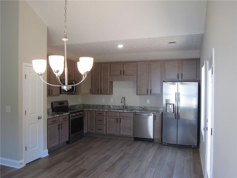 Furnished interior view inside a new home in , Dallas (Image 6).