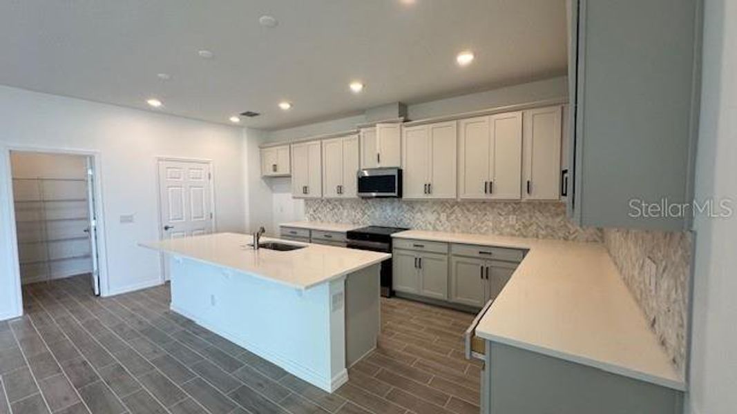 Furnished interior view inside a new home in Cypress Bluff, Groveland (Image 4).