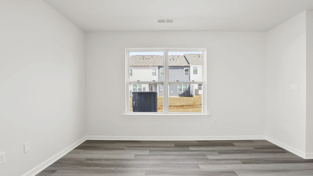 Spacious, unfurnished interior of a new home in Tanglewood Townes, Greenville (Image 16).