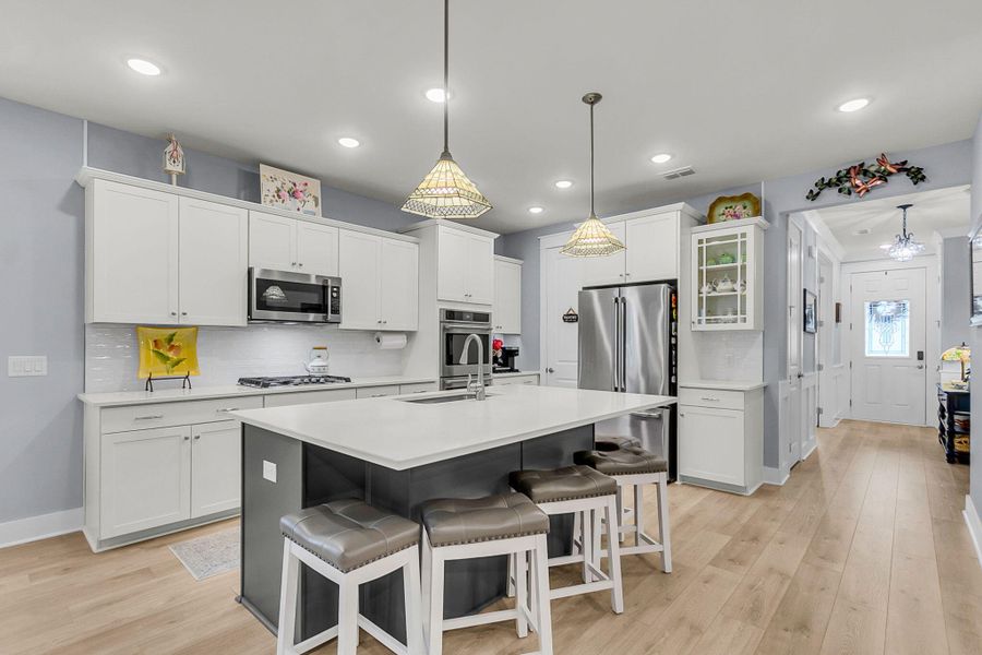 Furnished interior view inside a new home in K. Hovnanian's® Four Seasons at Lakes of Cane Bay, Summerville (Image 39).