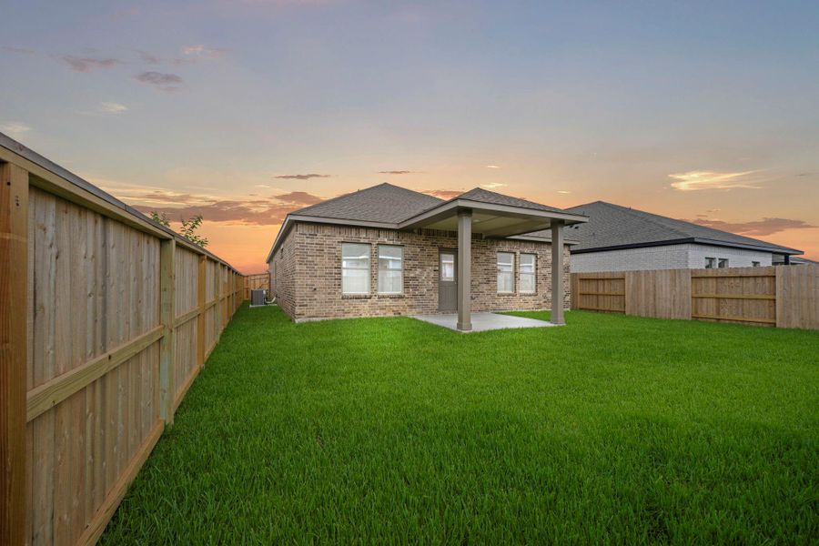 Exterior details and patio area of a home in Windrose Green, Angleton (Image 4). Exterior details and patio area of a home in Windrose Green, Angleton (Image 4).