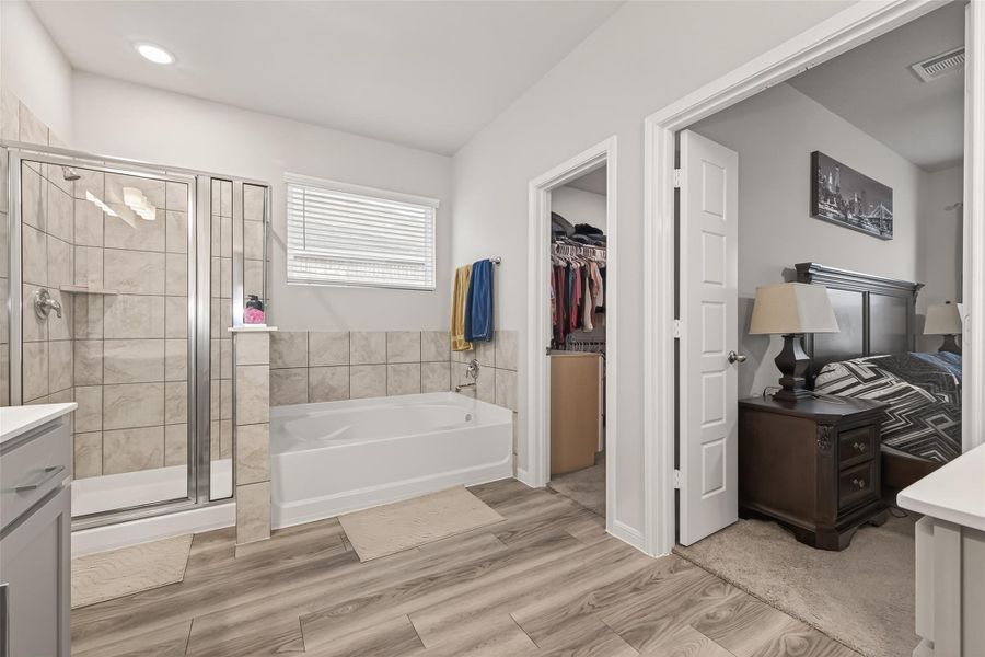 Furnished interior view inside a new home in Sunterra, Katy (Image 32).