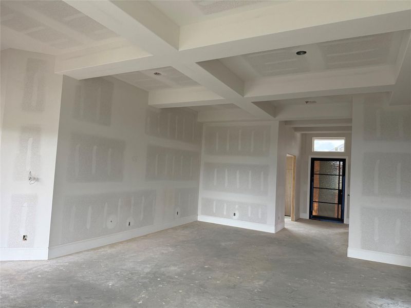 View of living room and stunning front door! View of living room and stunning front door!