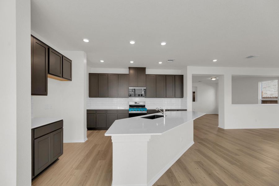 Furnished interior view inside a new home in Salerno - Classic Collection, Round Rock (Image 6). Furnished interior view inside a new home in Salerno - Classic Collection, Round Rock (Image 6).