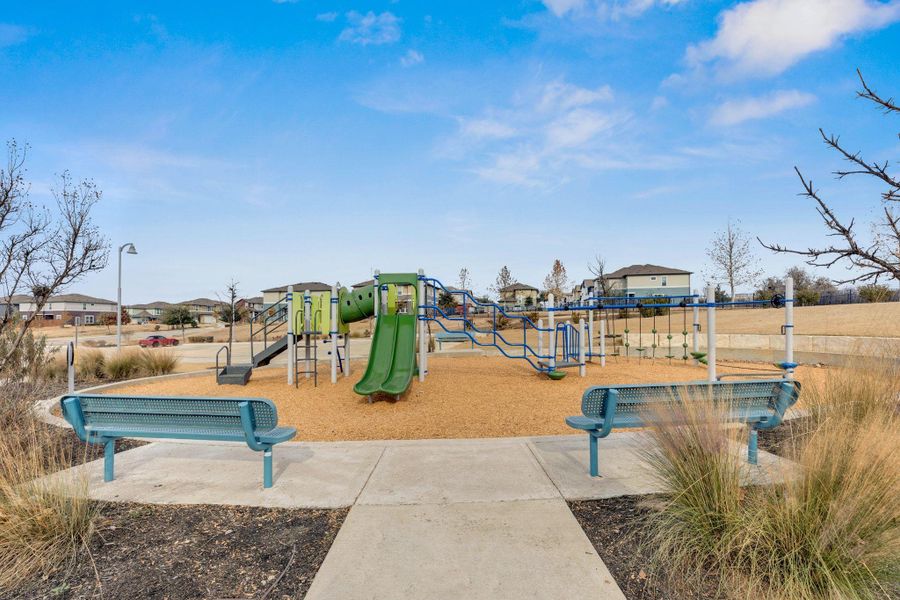 Communal playground with a residential view