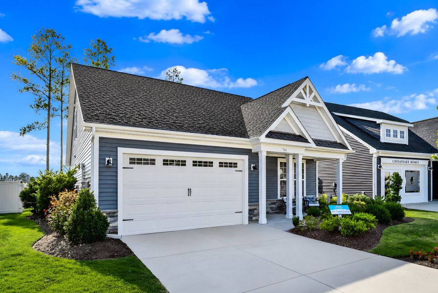 Representative exterior photo of a completed home built from the The Cherry Grove by Chesapeake Homes in Heritage Park at Longs, Longs, SC (Image 24).