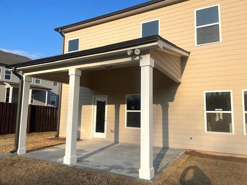 Exterior details and patio area of a home in Ponderosa Farms Estates, Gainesville (Image 3).
