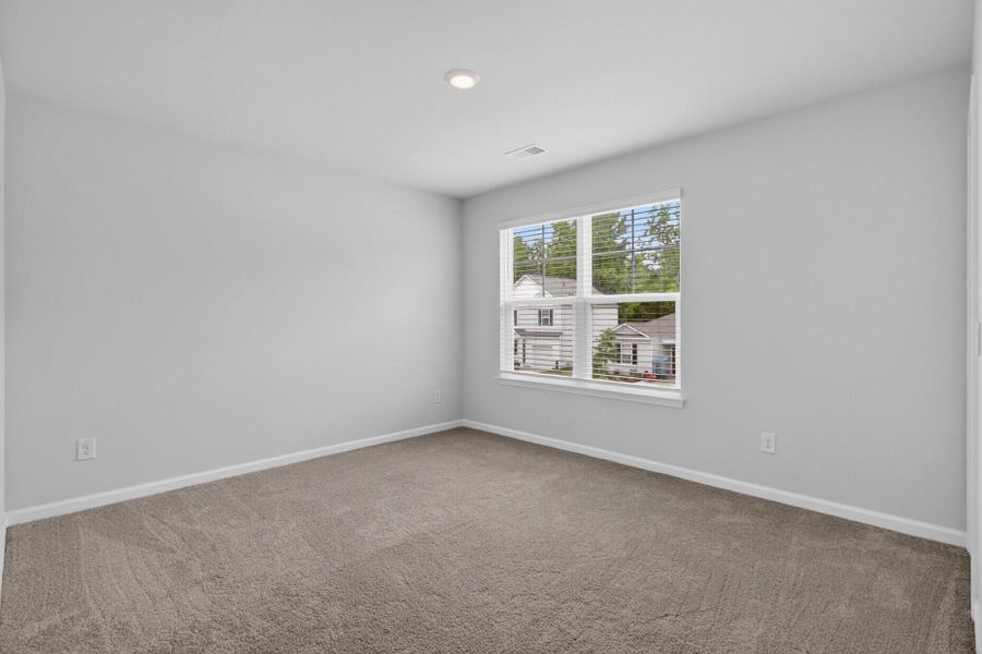 Spacious, unfurnished interior of a new home in Back River Bend, Goose Creek (Image 11).