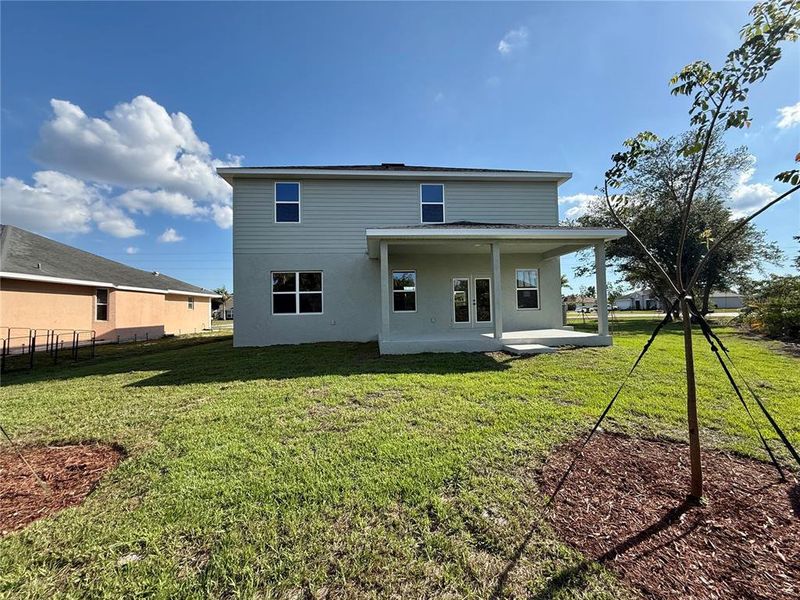 Exterior details and patio area of a home in Deep Creek, Punta Gorda (Image 4).