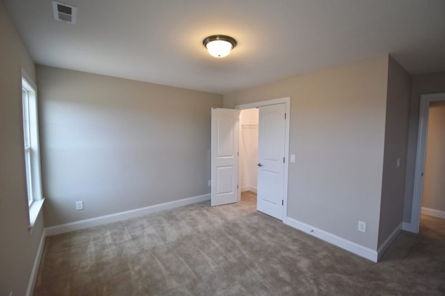 Representative unfurnished interior of a home built from the Lancaster by Keystone Homes NC in Preserve at Carriage Cove, Oak Ridge (Image 56).