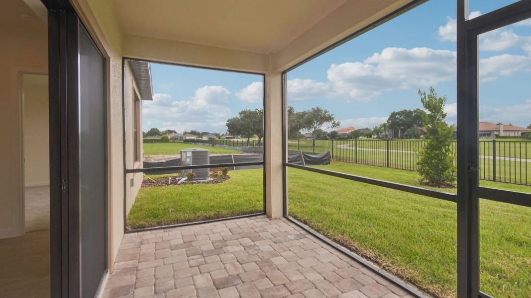 Exterior details and patio area of a home in Grasslands West, Lakeland (Image 4).