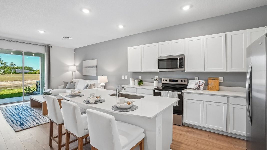 Representative furnished interior of a home built from the Ballantyne by D.R. Horton in Angeline Townhomes, Land O' Lakes (Image 14).