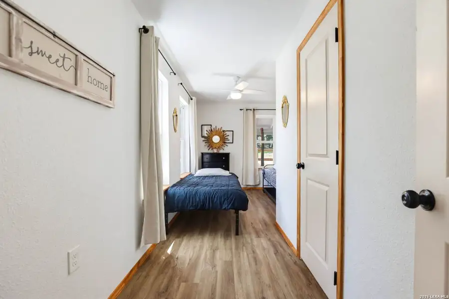 Furnished interior view inside a new home in , Lakehills (Image 12).