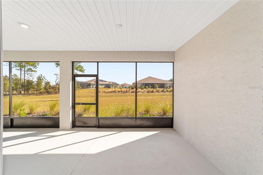 Exterior details and patio area of a home in On Top of the World Communities, Ocala (Image 24).