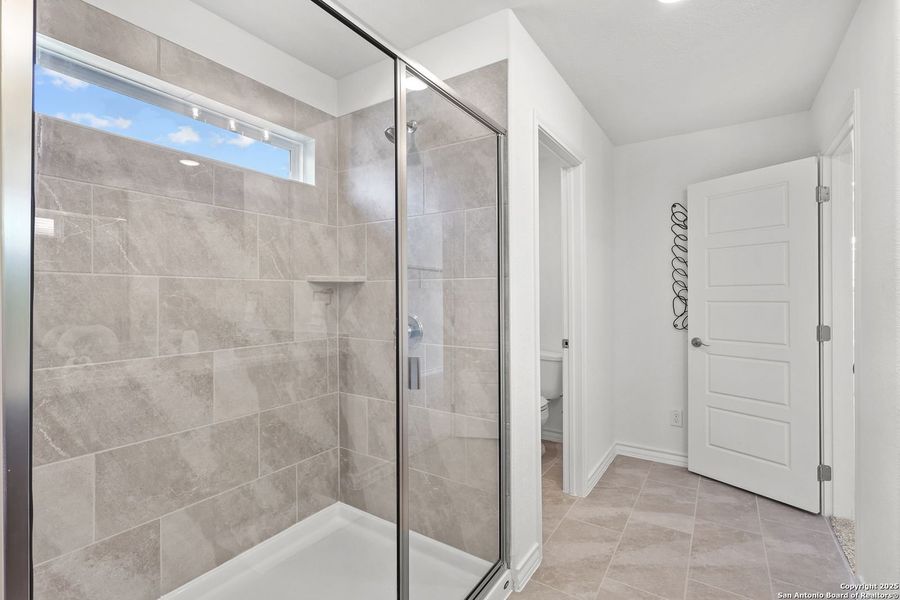Furnished interior view inside a new home in Ladera, San Antonio (Image 26).