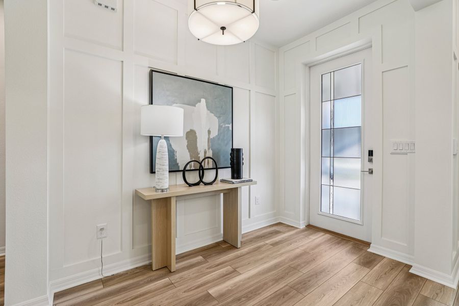 Representative furnished interior of a home built from the Briella by Risewell Homes in Country Club Estates, Palm Bay (Image 4).