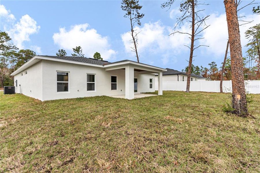 Exterior details and patio area of a home in , Ocala (Image 27).