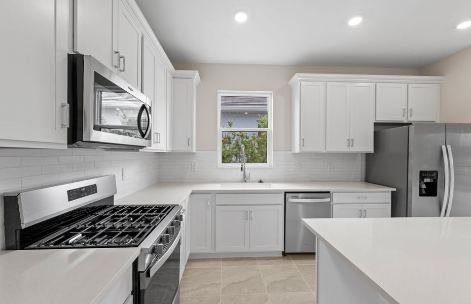 Furnished interior view inside a new home in Del Webb Oak Creek, North Fort Myers (Image 9).