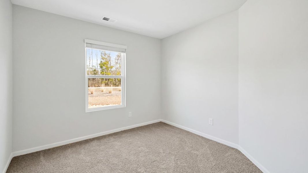 Representative unfurnished interior of a home built from the BAYSHORE by D.R. Horton in Indigo Preserve Townhomes, Leland (Image 27).
