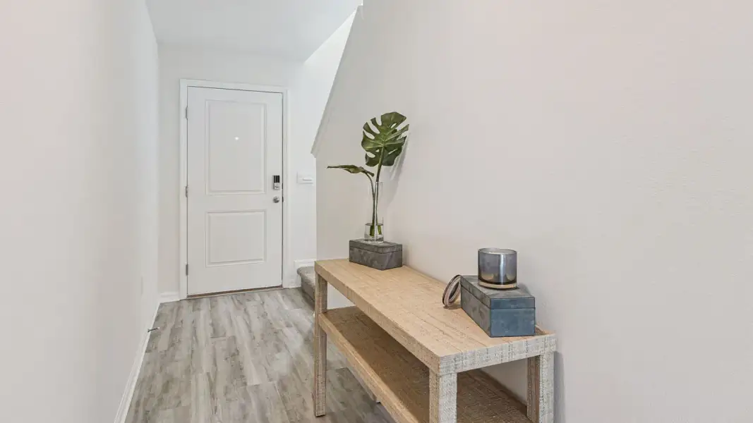 Furnished interior view inside a new home in Atria at Ridgewood Lakes, Davenport (Image 4).