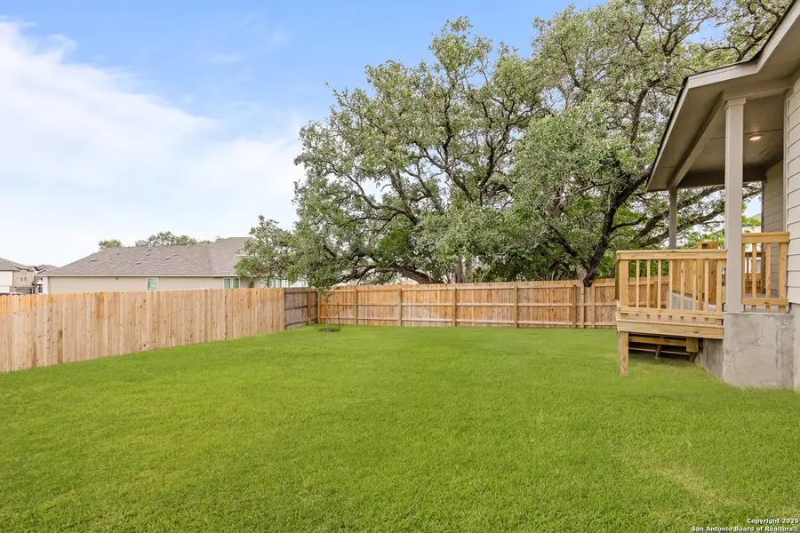 Front exterior of a new home in Hunter's Ranch, San Antonio, TX, highlighting curb appeal (Image 1). Front exterior of a new home in Hunter's Ranch, San Antonio, TX, highlighting curb appeal (Image 1).