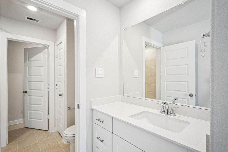 Furnished interior view inside a new home in Landing Meadows - Premier Series, New Caney (Image 10). Furnished interior view inside a new home in Landing Meadows - Premier Series, New Caney (Image 10).