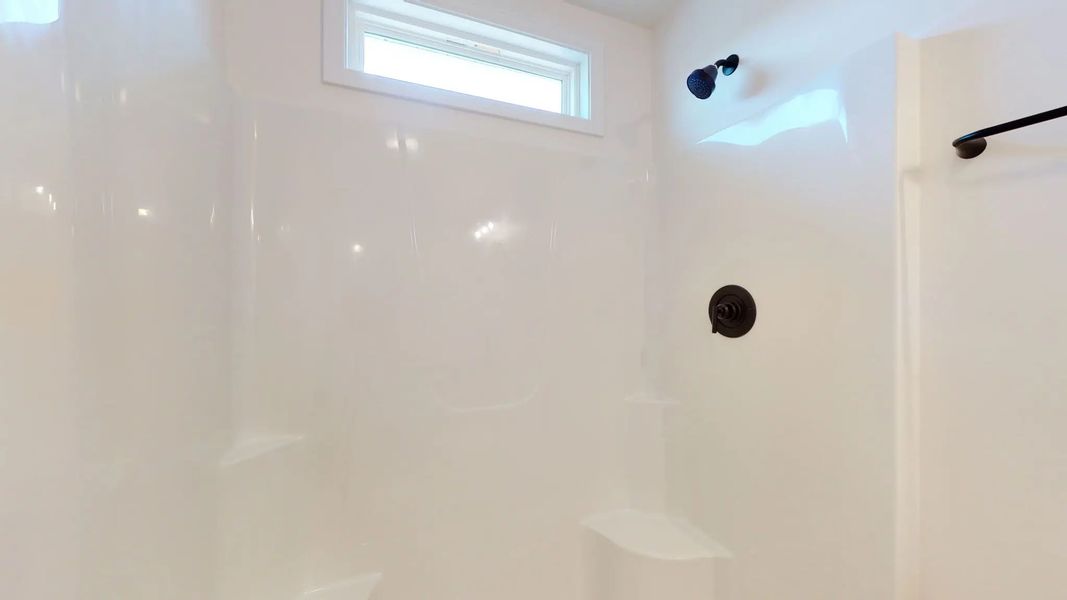 Representative furnished interior of a home built from the Catherine A by JC Jackson Homes,LLC in Heritage Pointe, Newport (Image 7).