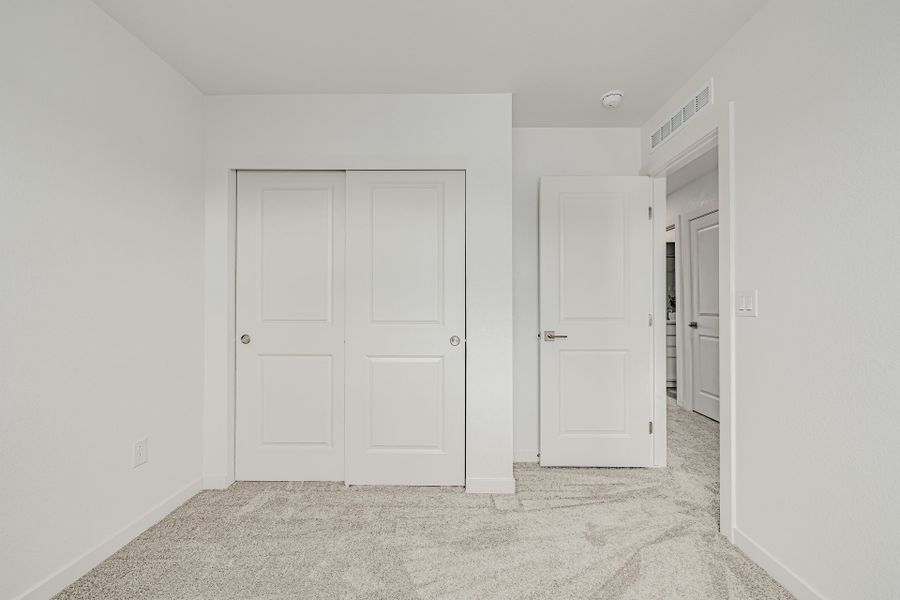 Spacious, unfurnished interior of a new home in The Hub at Virginia Village, Denver (Image 22).