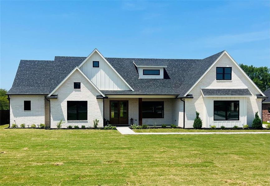 Front exterior of a new home in , Bells, TX, highlighting curb appeal (Image 22). Front exterior of a new home in , Bells, TX, highlighting curb appeal (Image 22).