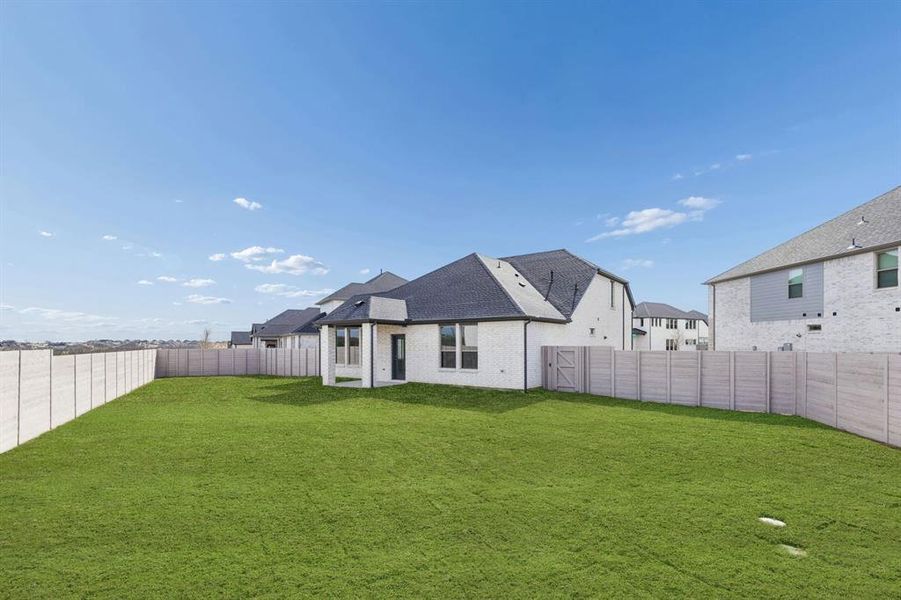 Covered Patio in the Stanley II home plan by Trophy Signature Homes – REPRESENTATIVE PHOTO